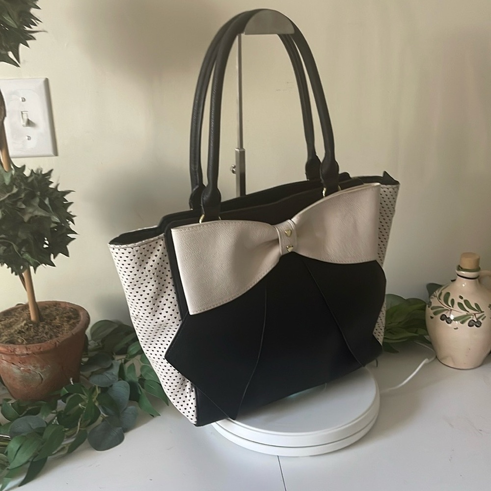 Betsey Johnson elegant black & white adorned with sophisticated bow on front.